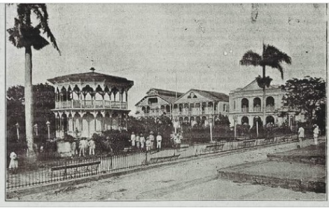 c. 1908 Puerto Plata Panoramic view of Parque Central Independencia (Independence Central Park) showing the east side buildings. From north to south are the Recio Theater (?), Government House, and City Hall. Source: "The Cradle of America" (magazine), AGN (Archivo General de la Nación (General Archive of the Nation of the Dominican Republic), Images of Our History.®